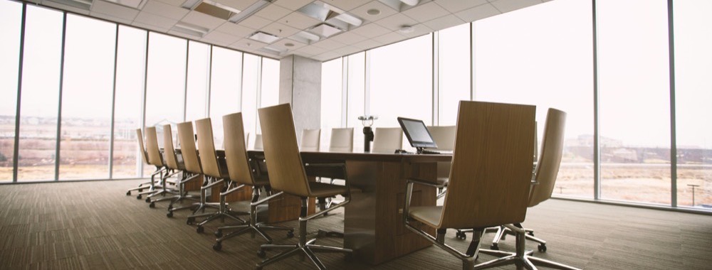Boardroom equipped for conferencing and collaboration