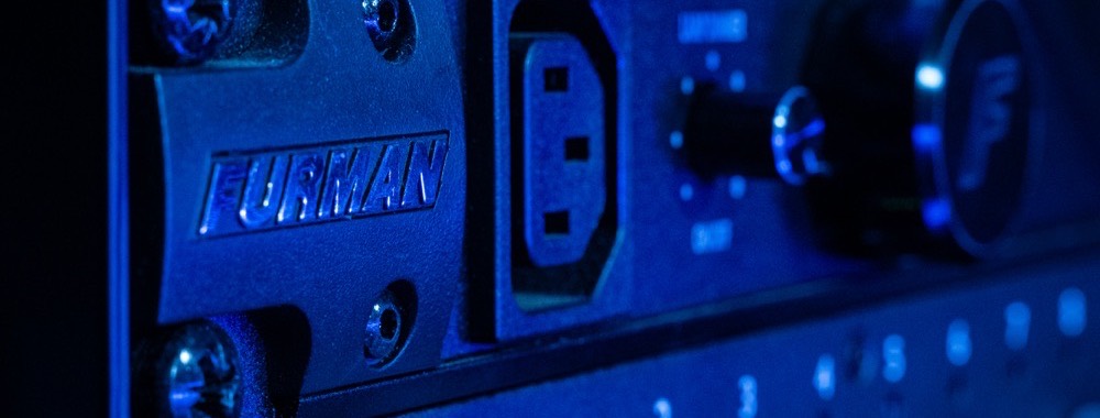 Rack-mounted power conditioning and distribution unit