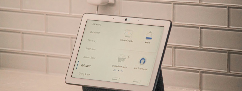 Smart home display showing room-by-room control